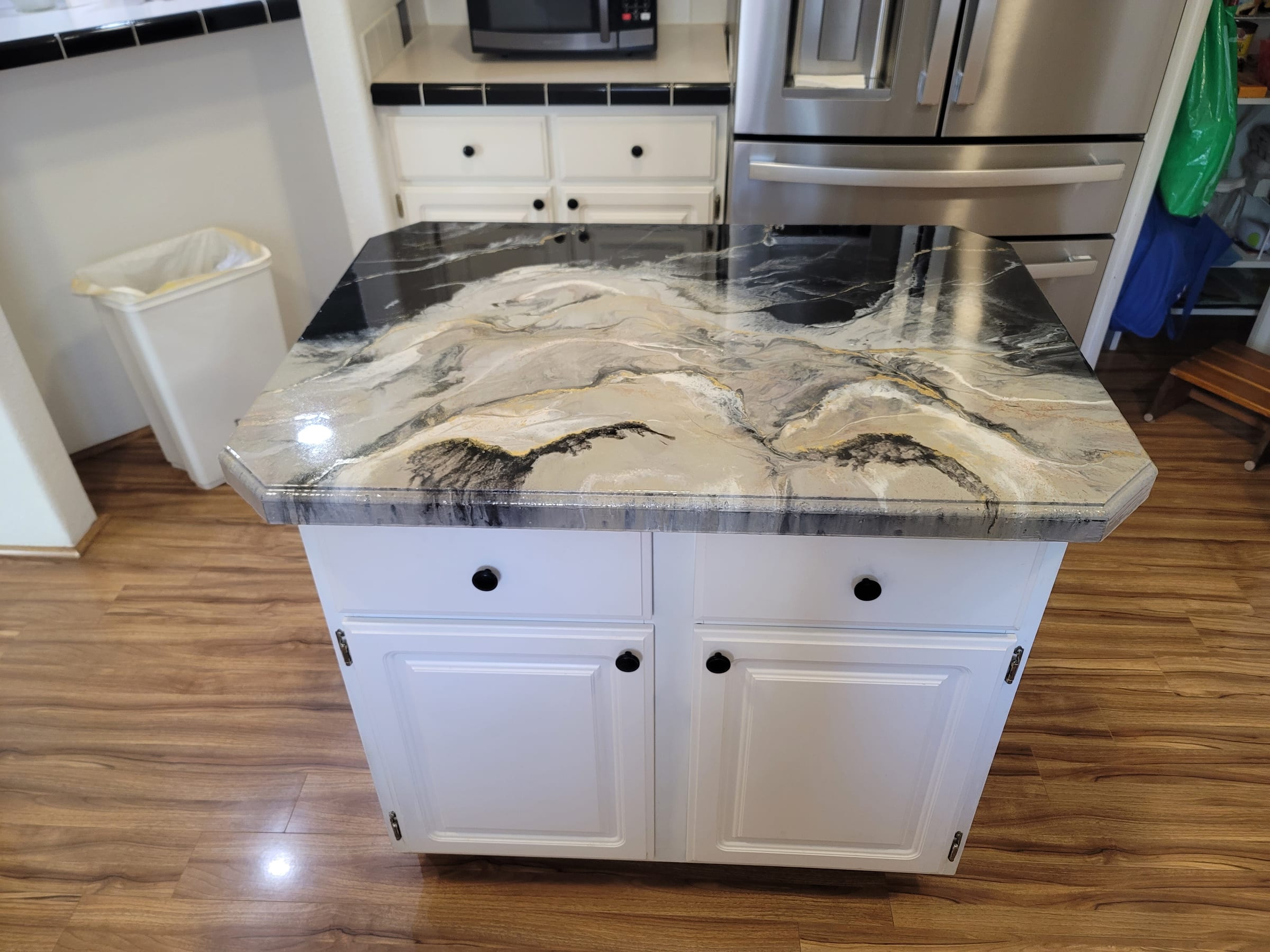 Black and gold marble-effect epoxy kitchen island by Ray Sample, Castle Rock CO